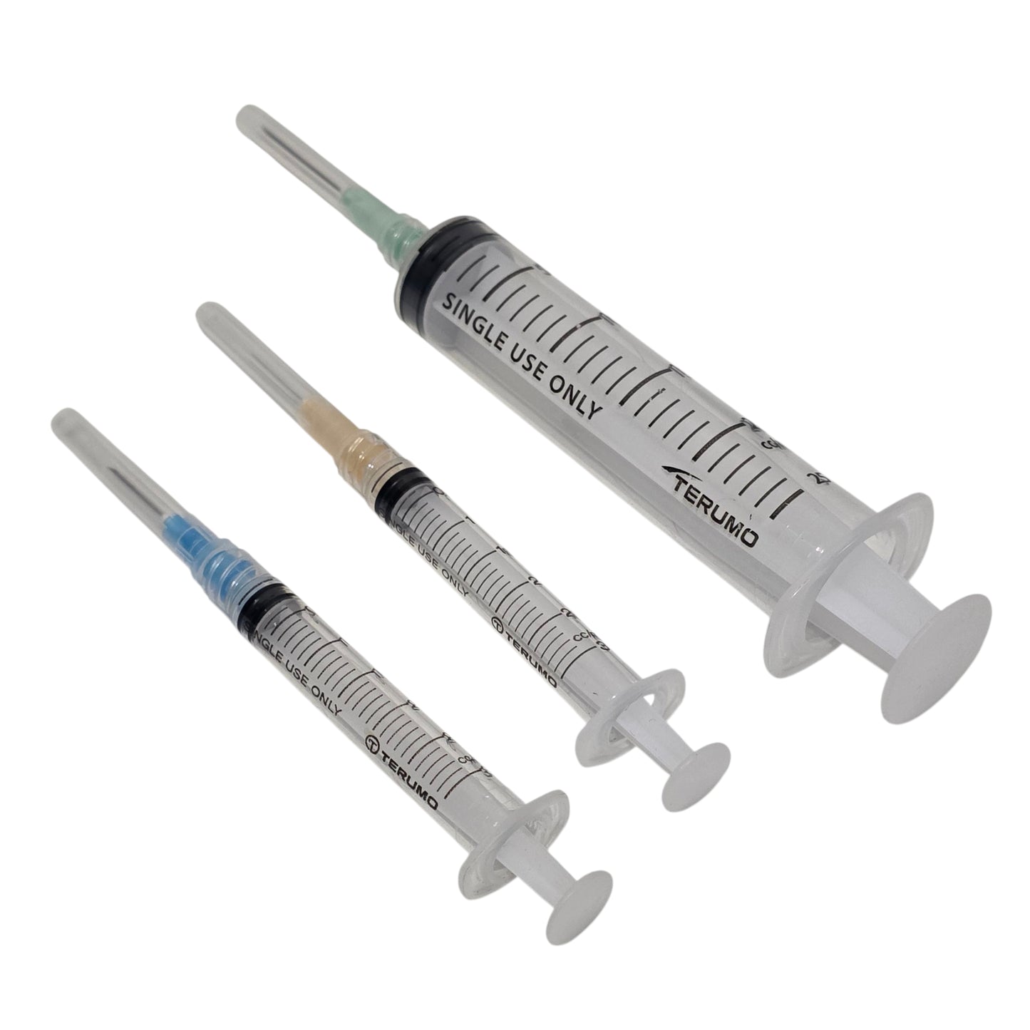 Three Terumo syringes with needles attached on a white background