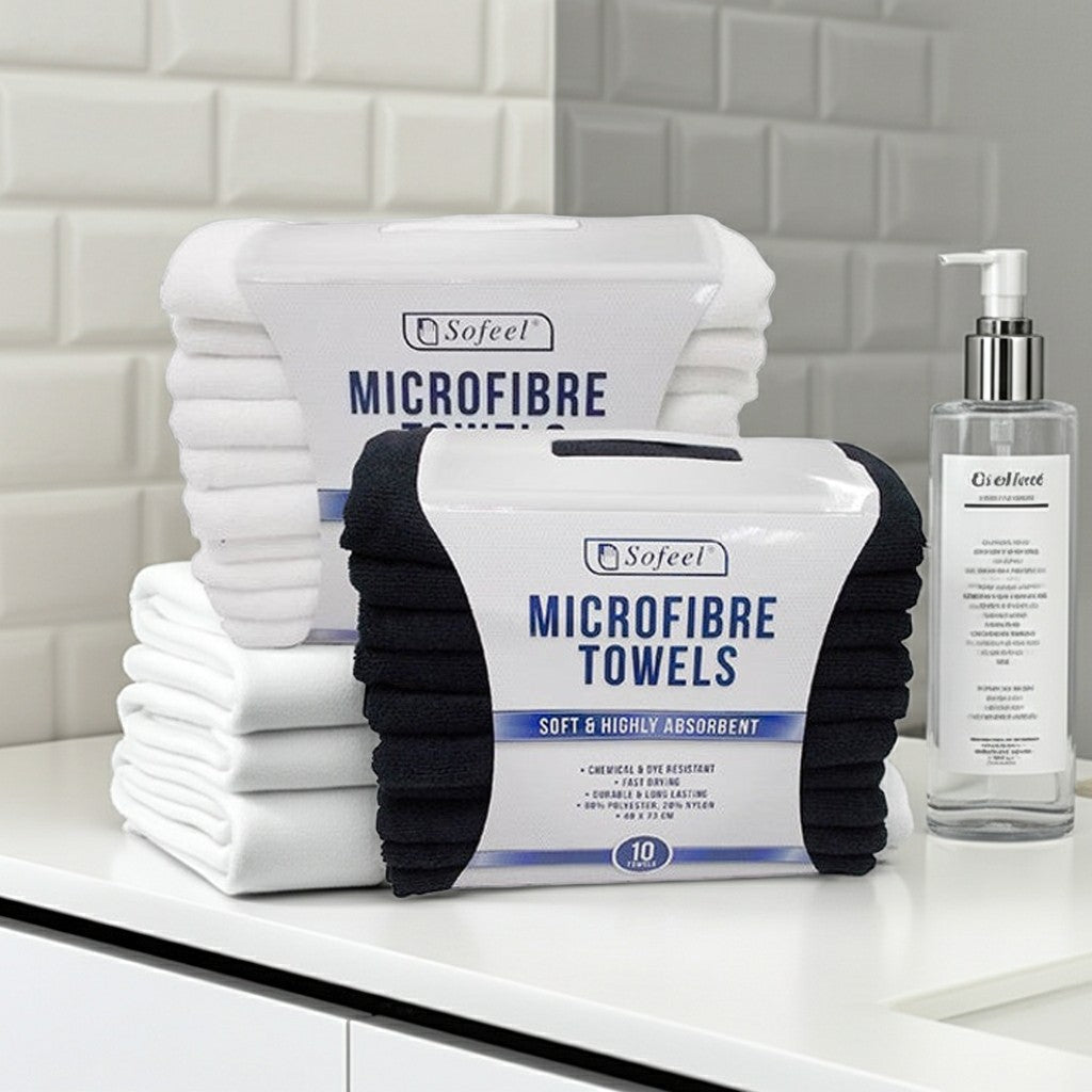Two Packs of microfiber towels with packaging on a bathroom counter