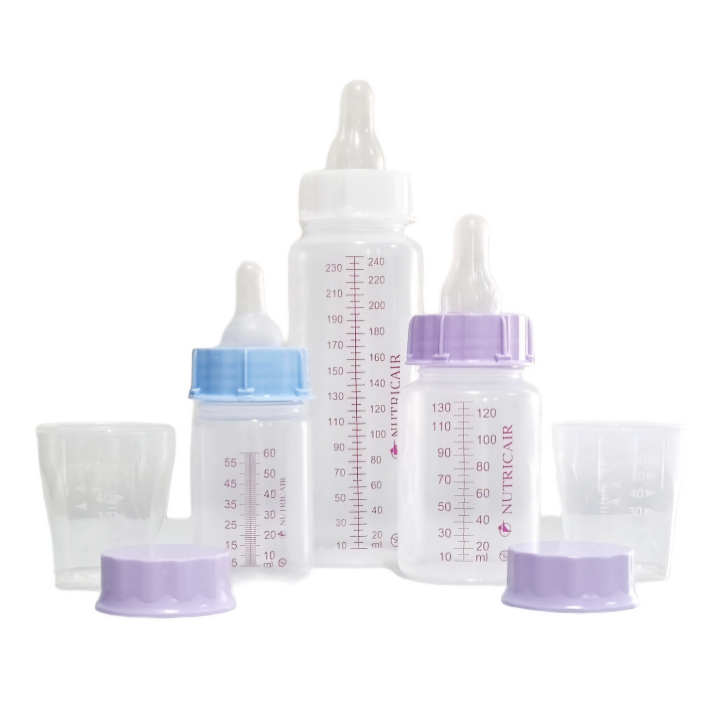 A set of Nutricair baby bottles with measurement markings and corresponding soft silicone teats in different flow speeds, with caps in purple, blue, and white colors.