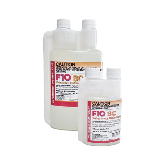 Two bottles of F10 SC Veterinary Disinfectant in different sizes with labels indicating usage for bacteria, viruses, and fungi.