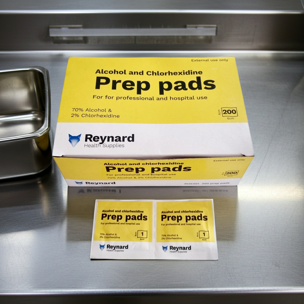 Box of Alcohol and Chlorhexidine Prep pads on a metallic surface