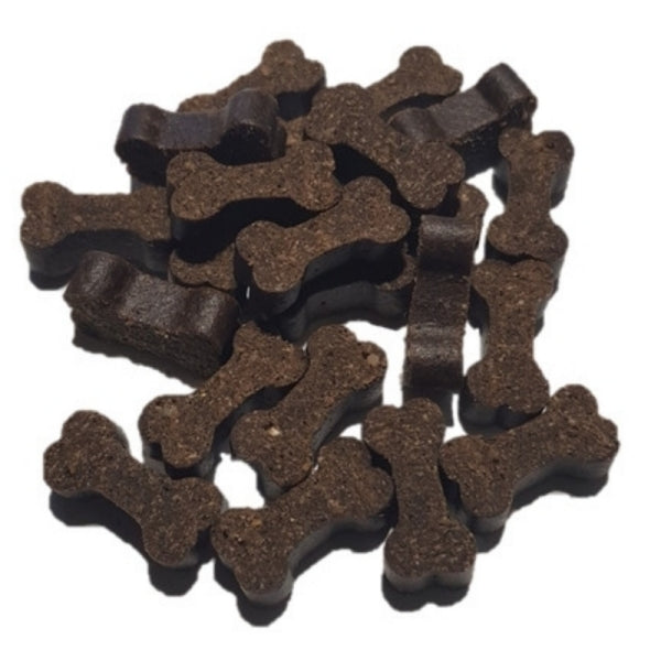 Beef bone-shaped dog treats on a white background