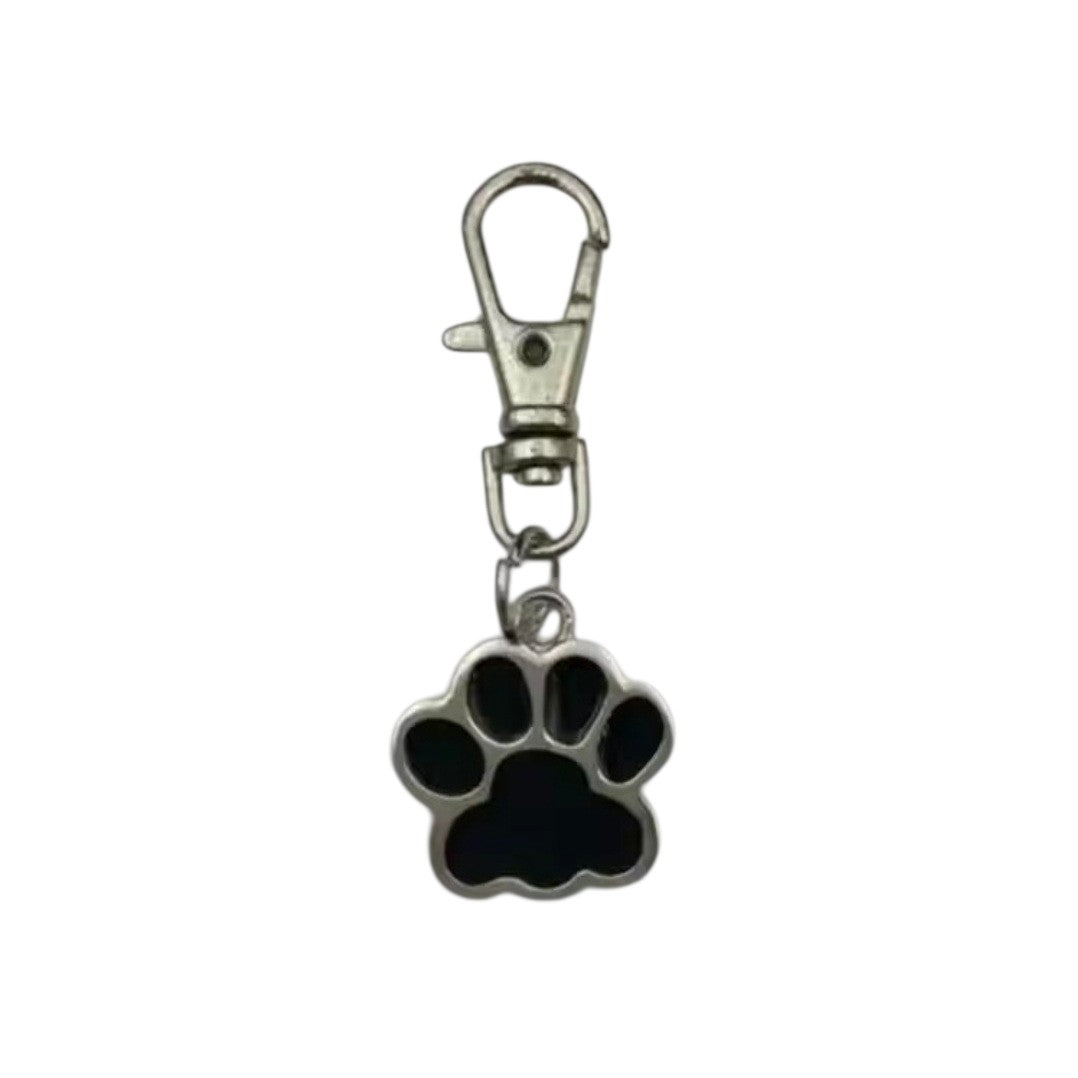 Black paw print keychain with a metal clasp on a white background