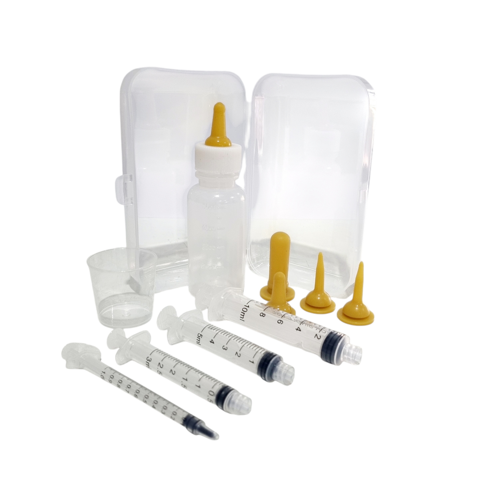 A bottle and syringe feeding kit for neonates, including a clear plastic bottle, multiple feeding teats, luer lock syringes in different sizes, a measuring cup, and a clear plastic storage case.