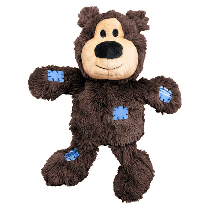 Brown plush KONG Wild Knots toy with blue paw pads on a white background