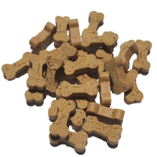 Dog treats shaped like bones on a white background