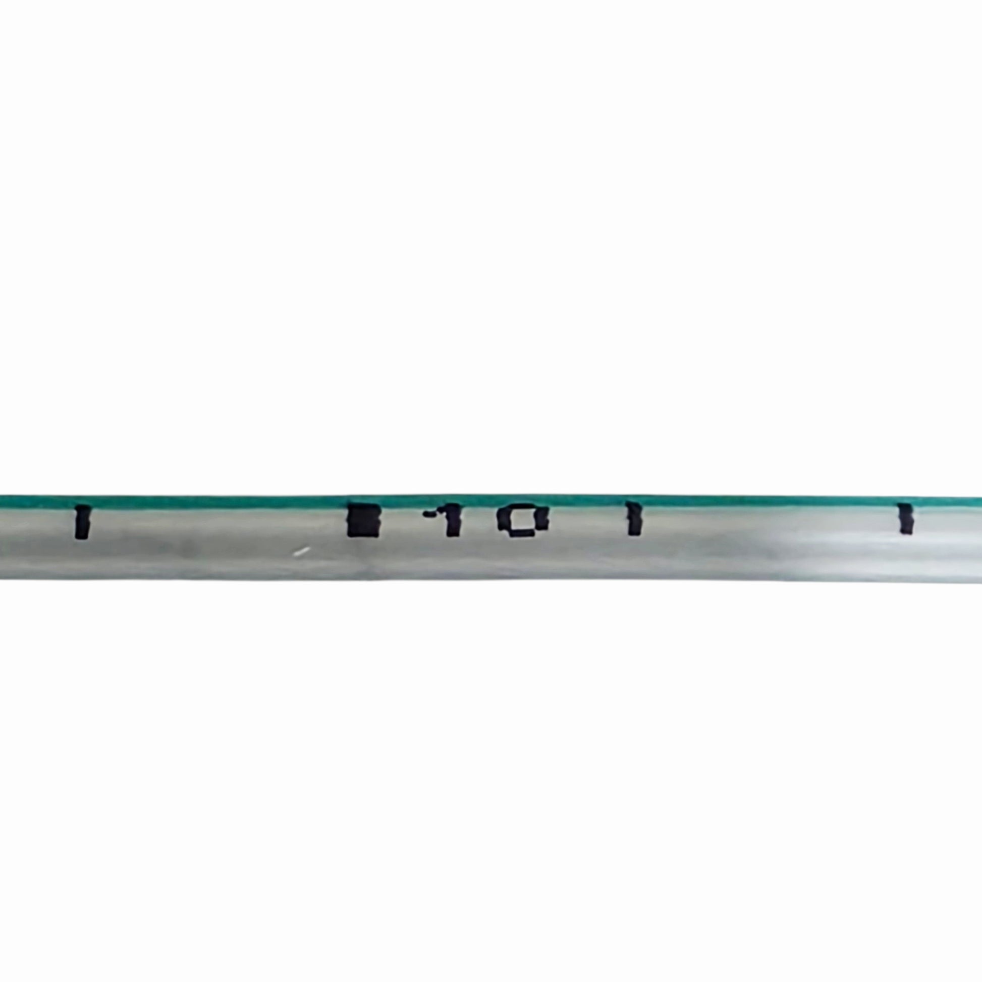 Close-up of measurements on a feeding tube on a white background