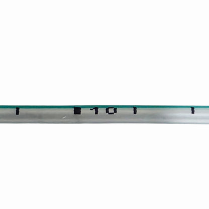 Close-up of measurements on a feeding tube on a white background