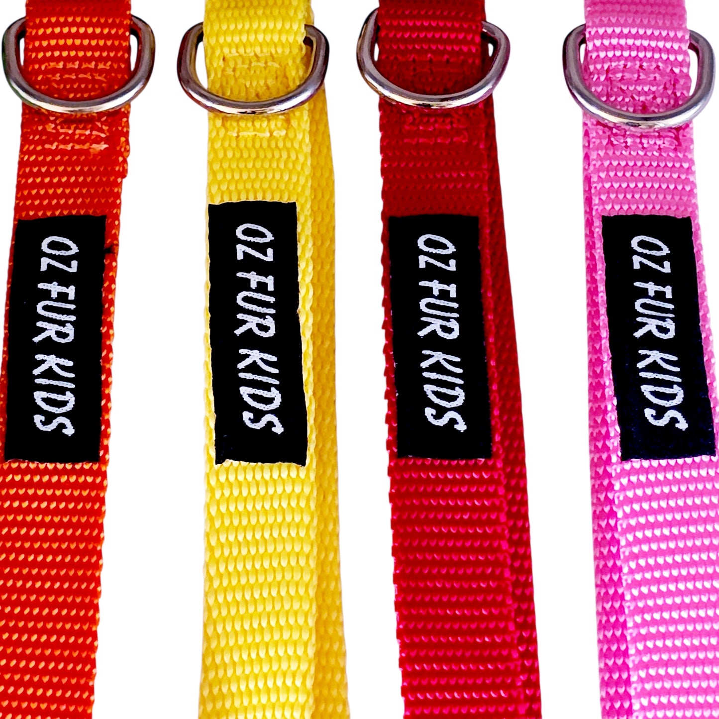 Four colorful dog collars with 'OZ FUR KIDS' labels on a white background