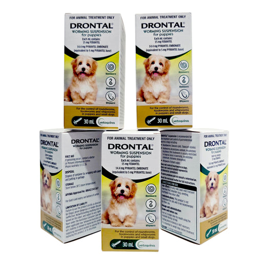Five boxes of Drontal Worming Suspension for Puppies on a white background