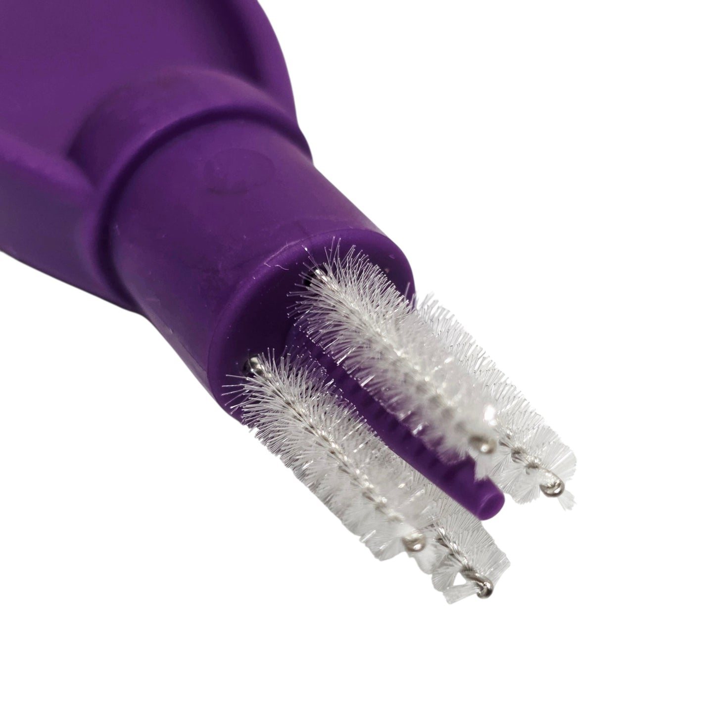 Close-up of a purple ENfit Enclean Re-usable Cleaning Brush with bristle head on a white background