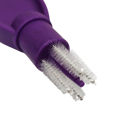 Close-up of a purple ENfit Enclean Re-usable Cleaning Brush with bristle head on a white background