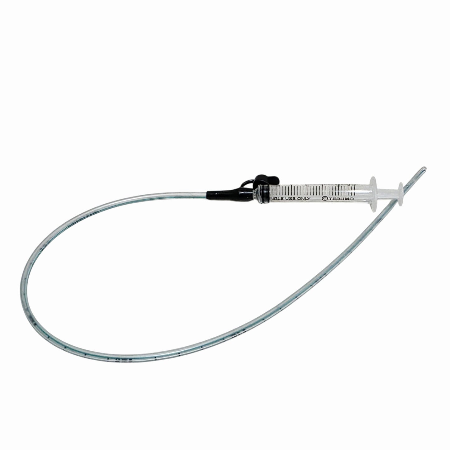 Luer slip feeding tube with syringe on a white background