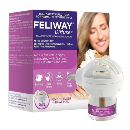 Feliway diffuser packaging with a woman holding a cat on a white background