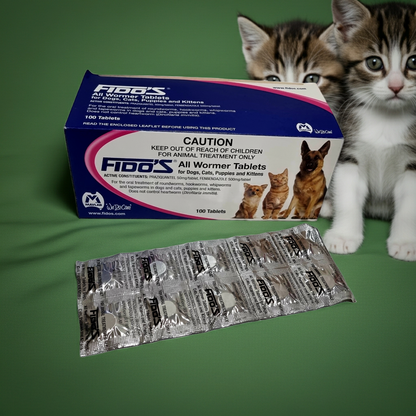 Fido's All Wormer Tablets packaging with two kittens on a green background