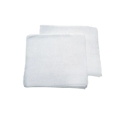 Two white gauze swabs on a white background