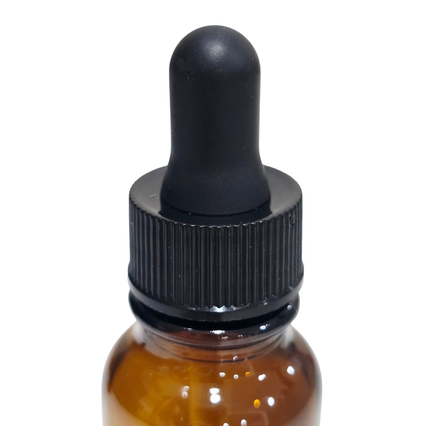 Amber glass dropper bottle black cap on a white background