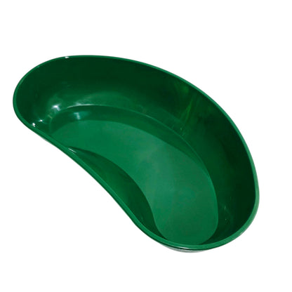 Green plastic kidney dish on a white background