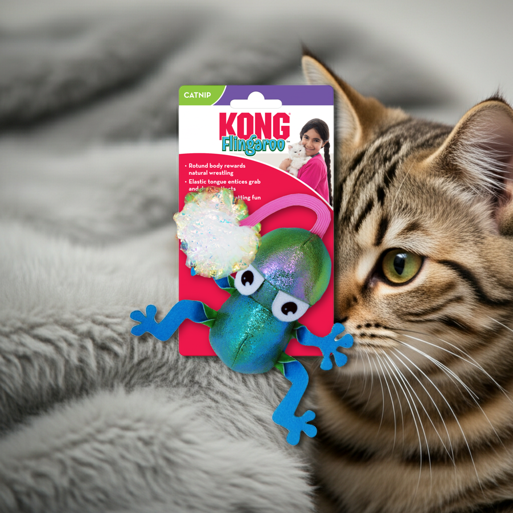 Kong Flingaroo cat toy with packaging and a cat interacting with it on a soft surface