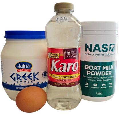 Jalna Greek Style yogurt, Karo corn syrup, and NASO goat milk powder with an egg on a white background.