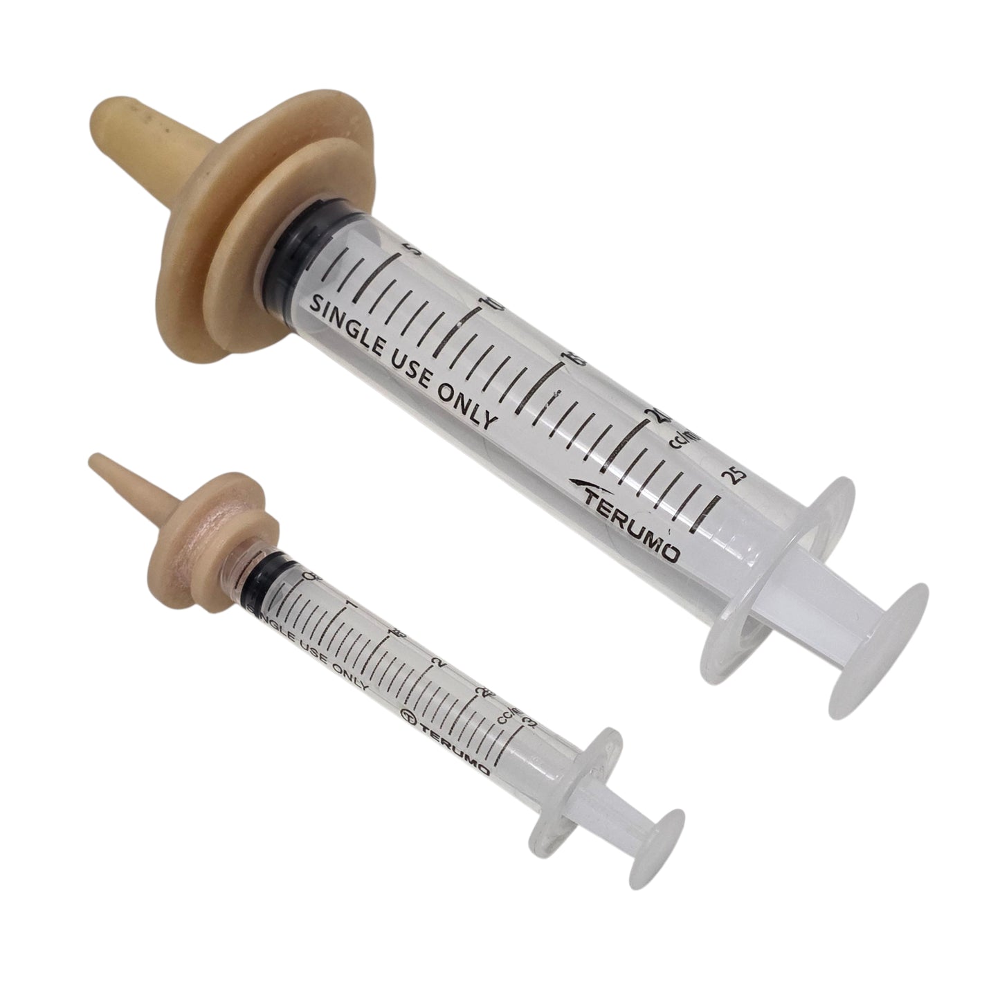 Two luer lock syringes with Miracle Nipples on a white background