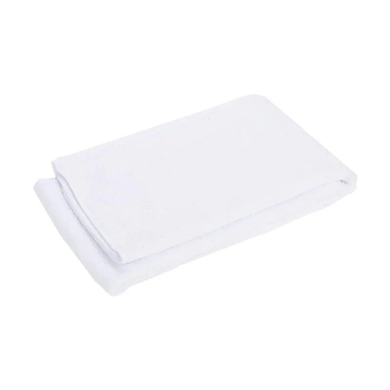 White folded microfibre towel on a white background
