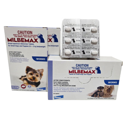 Milbemax packaging for dogs with tablets and boxes on a white background