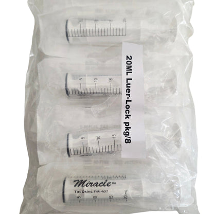 Packet of 8 O ring Miracle Luer-Lock syringes with measurement markings on a white background
