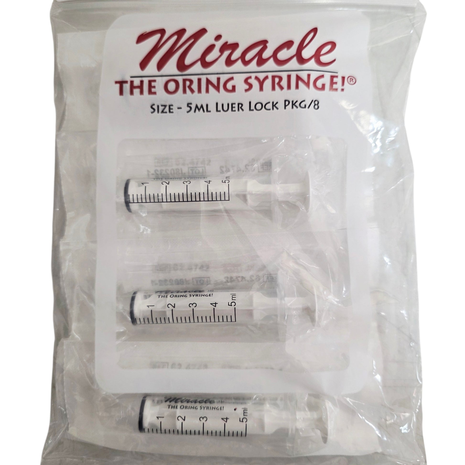 Packet of 8, 5mL luer lock syringes with 'Miracle' branding on a white background