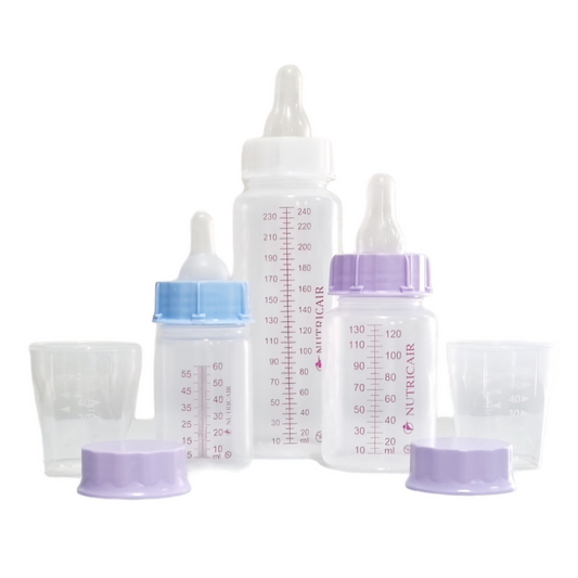 A set of Nutricair baby bottles with measurement markings and corresponding soft silicone teats in different flow speeds, with caps in purple, blue, and white colors.