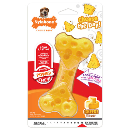 A Nylabone Dura-Chew Cheese dog toy in packaging, shaped like a cheese wheel with flavor pockets, intended for chewing and playing with by dogs.