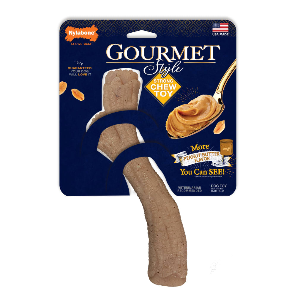 A Nylabone Gourmet Style Strong Chew Toy in peanut butter flavor, packaged on a blue background. The toy is designed in a souper size and is made of a durable material, with visible peanut butter bits on it.