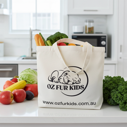 Tote bag with 'OZ Fur Kids' logo filled with groceries on a kitchen counter