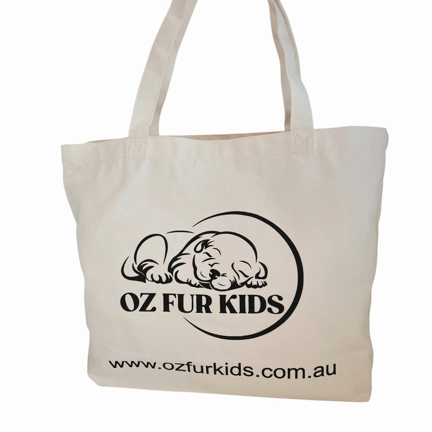 Beige tote bag with 'OZ FUR KIDS' logo and website on a white background