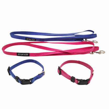 Two Oz Fur Kids dog collars and leashes in blue and pink on a white background