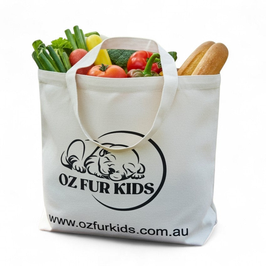 Tote bag with groceries and 'OZ Fur Kids' logo on a white background