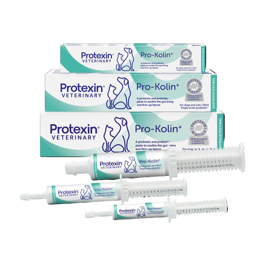Three boxes and four syringe-style vials of Protexin Veterinary Pro-Kolin+ pet supplement arranged on a solid black background.