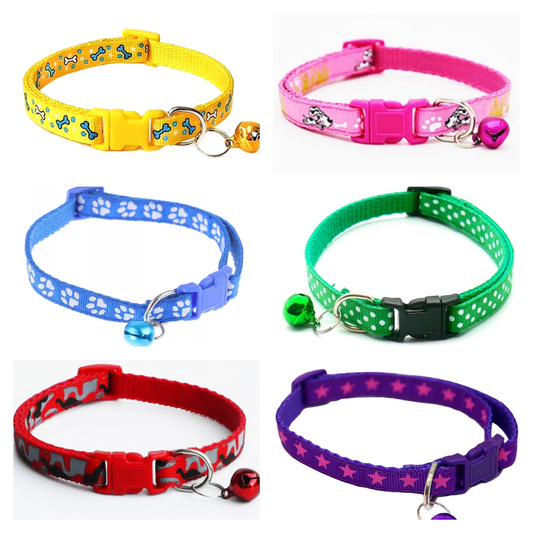 A set of six colorful puppy collars with various patterns such as stars, dogs, polka dots, and hearts. Each collar includes a bell and is fastened with a side clip.