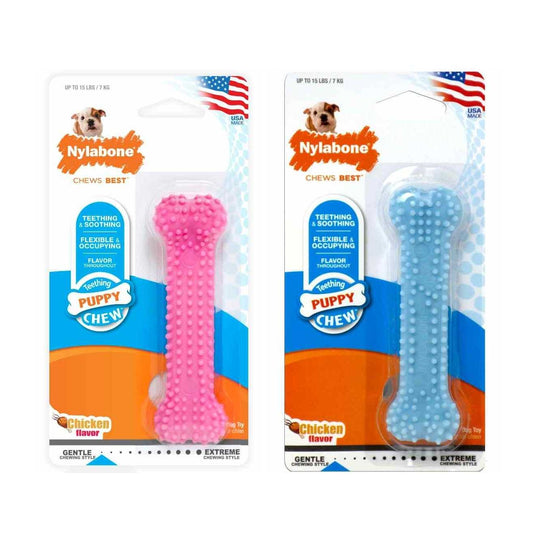 Two Nylabone puppy chew toys in packaging on a white background