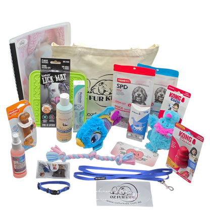Puppy Pack Deluxe Small Medium. Assorted pet care products including toys, leashes, and grooming items on a white background.