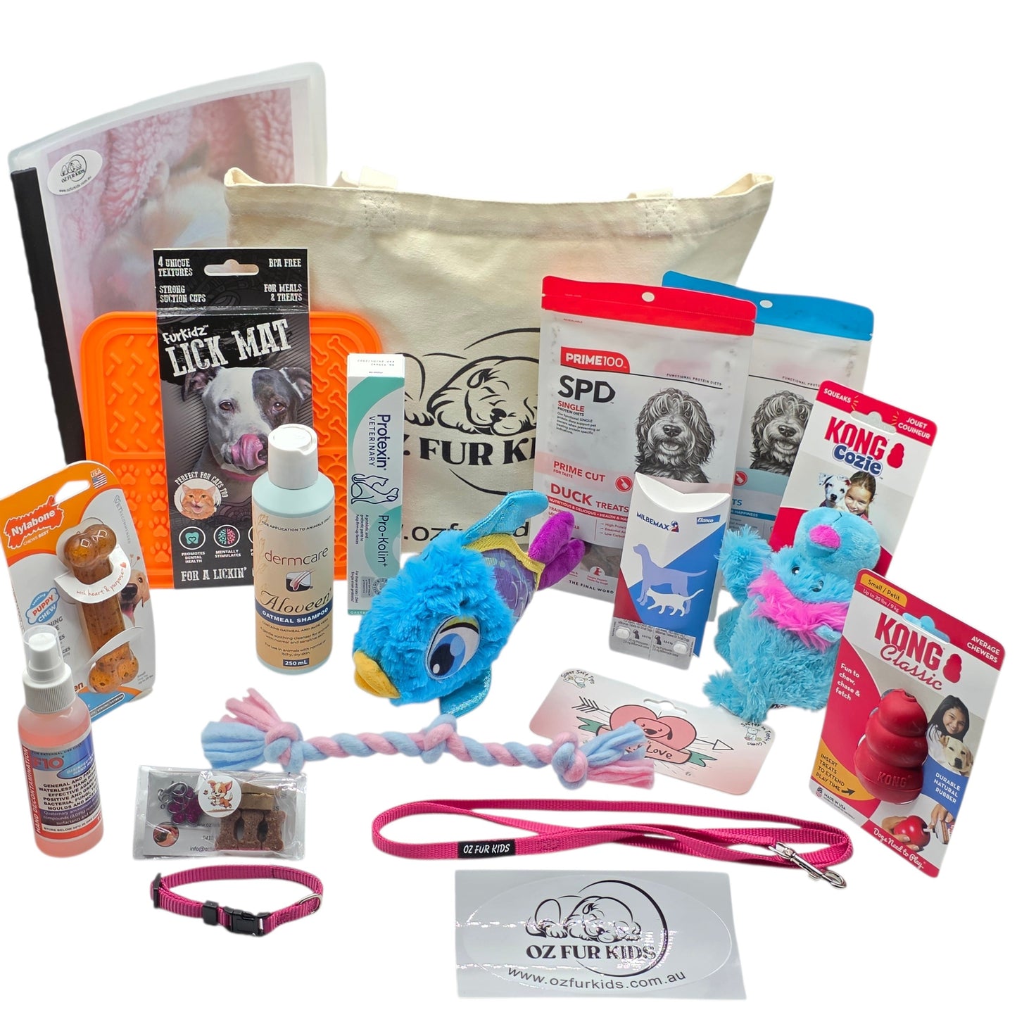 Puppy Pack Deluxe Small Medium Pink. Assorted pet products including toys, leashes, and grooming items on a white background.