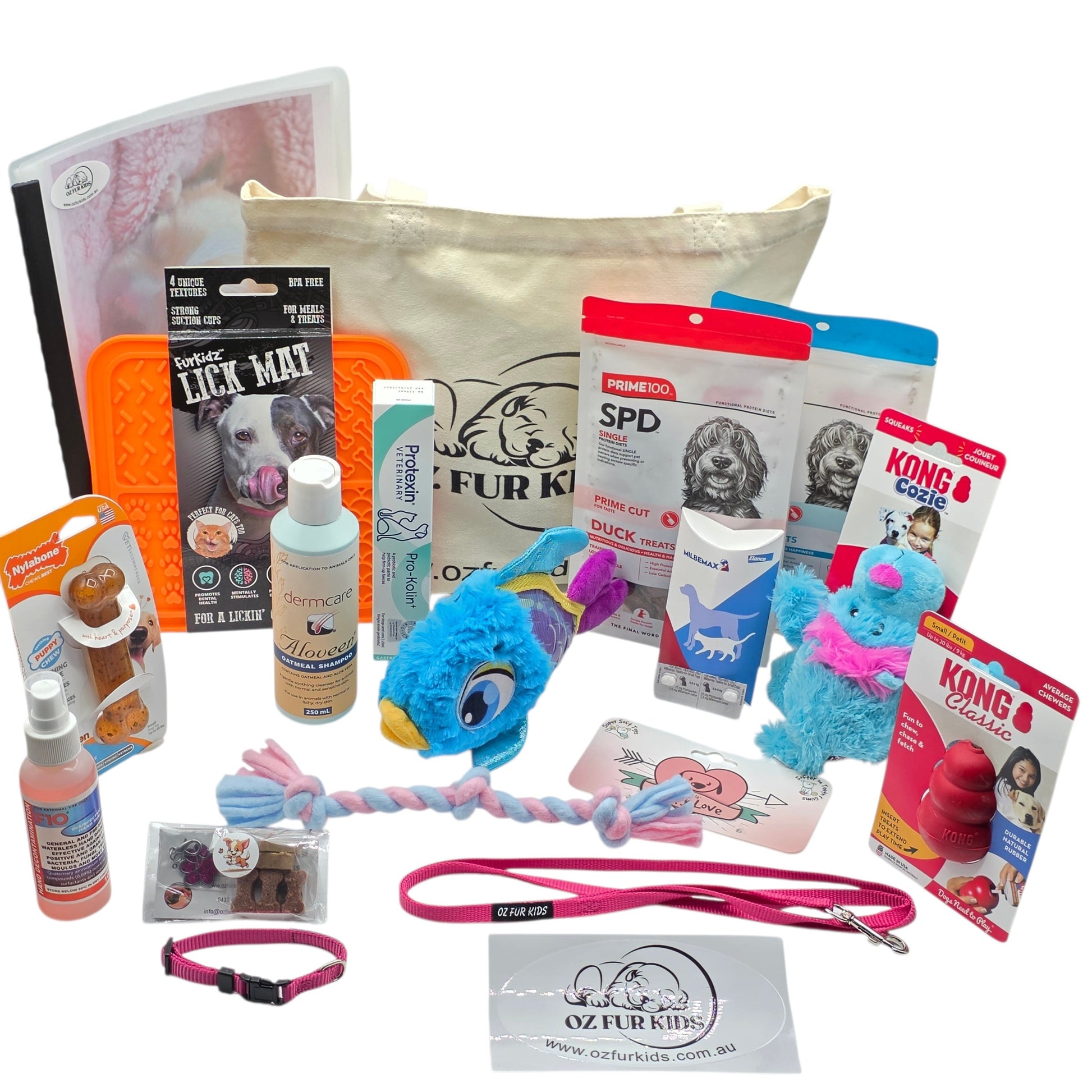 Puppy Pack Deluxe Small Medium Pink. Assorted pet products including toys, leashes, and grooming items on a white background.