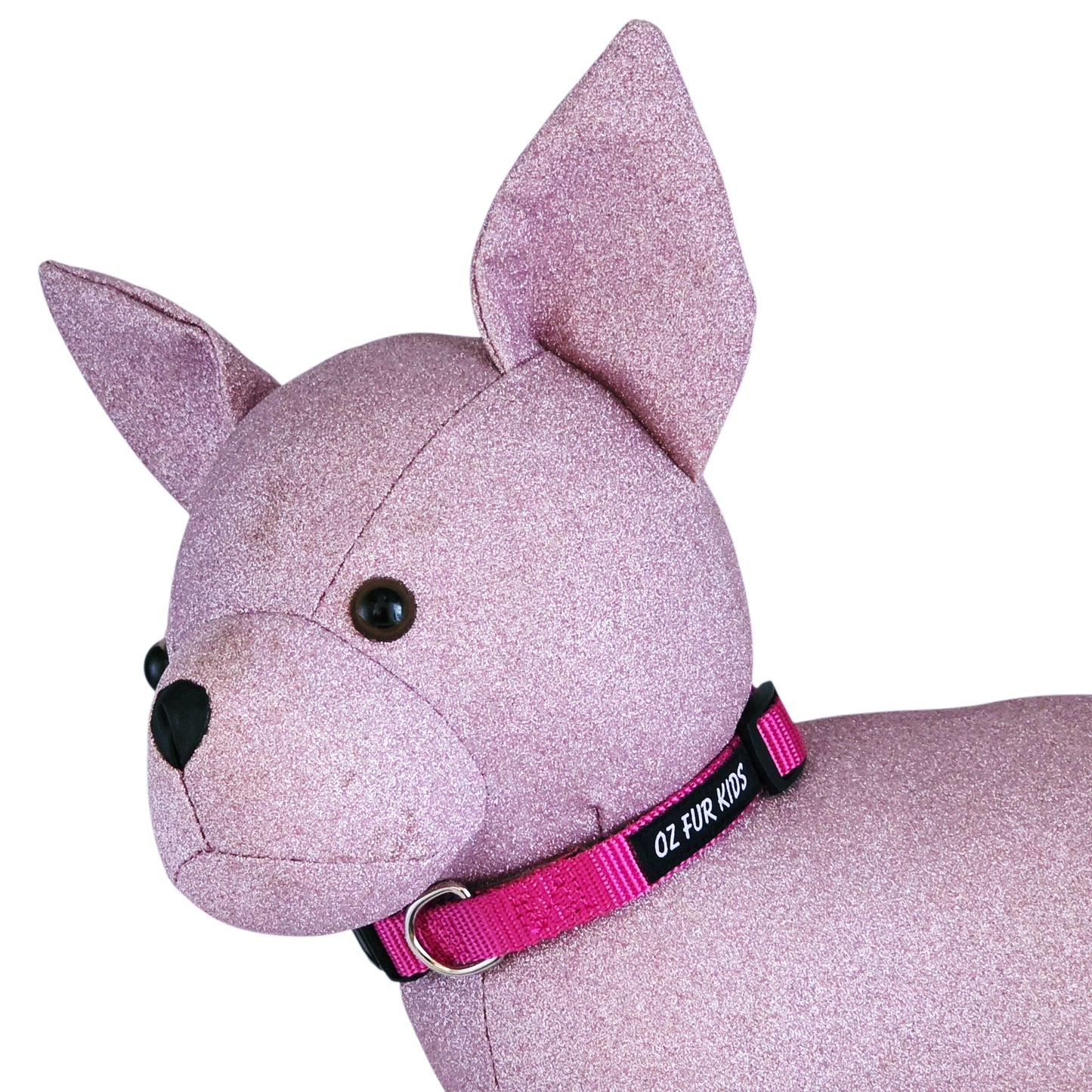 Pink glittery dog toy with a pink collar on a white background