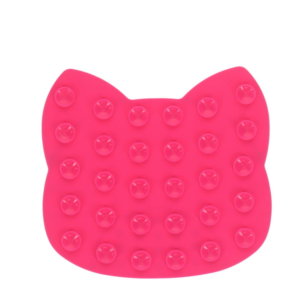 Pink cat-shaped cushion with bubble texture on a white background