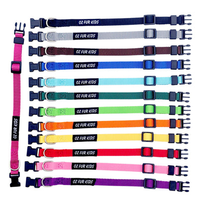 Set of 13 Oz Fur Kids Puppy ID Collars in solid colours on a white background