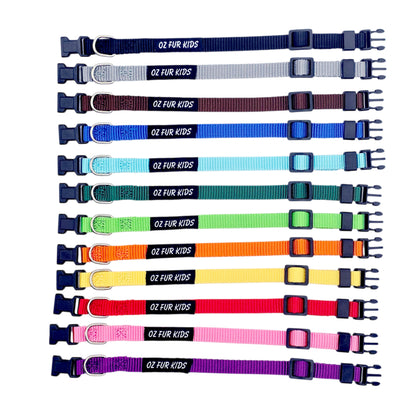 Set of 13 Oz Fur Kids Puppy ID Collars in solid colours on a white background