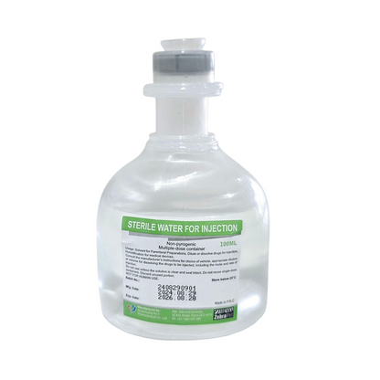 Bottle of sterile water for injection on a white background