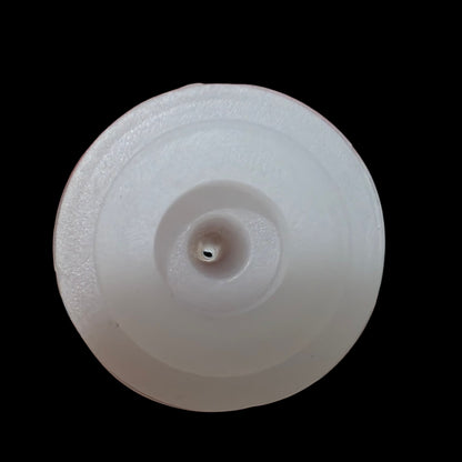 SuckleSoft Feeding Kit showing the small central pre made hole, shown against a solid black background.