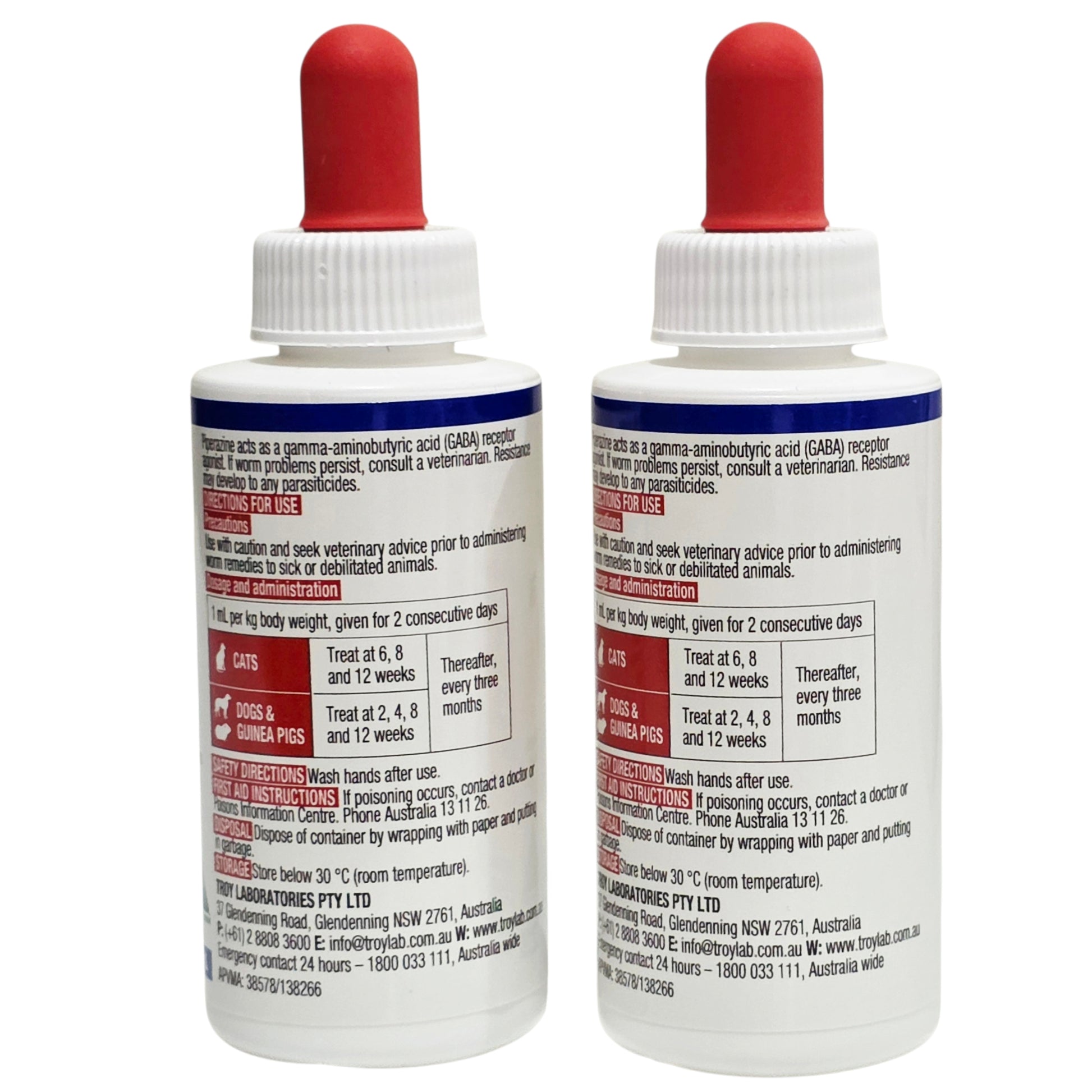 Two Troy Puppy & Kitten Worm Syrup bottles with instructions and red caps on a white background
