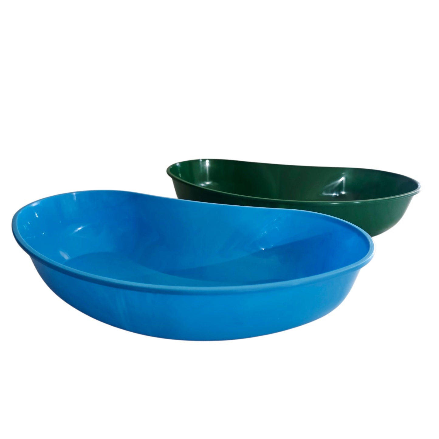 Two kidney dishes, one blue and one green, on a white background